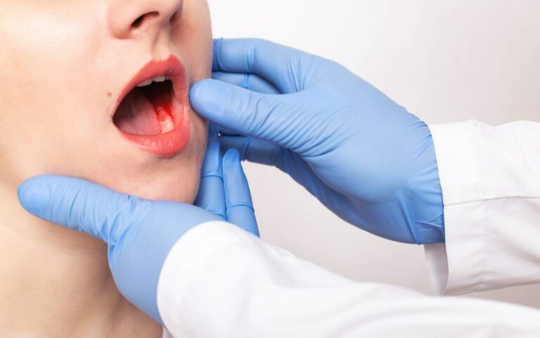 Woman get teeth examined