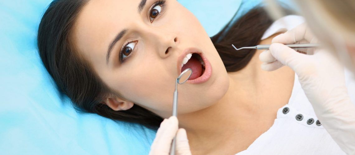 A woman getting treated for cavities